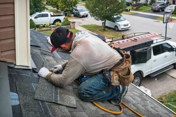 Professional Roof Repair technician working in Moonachie, NJ